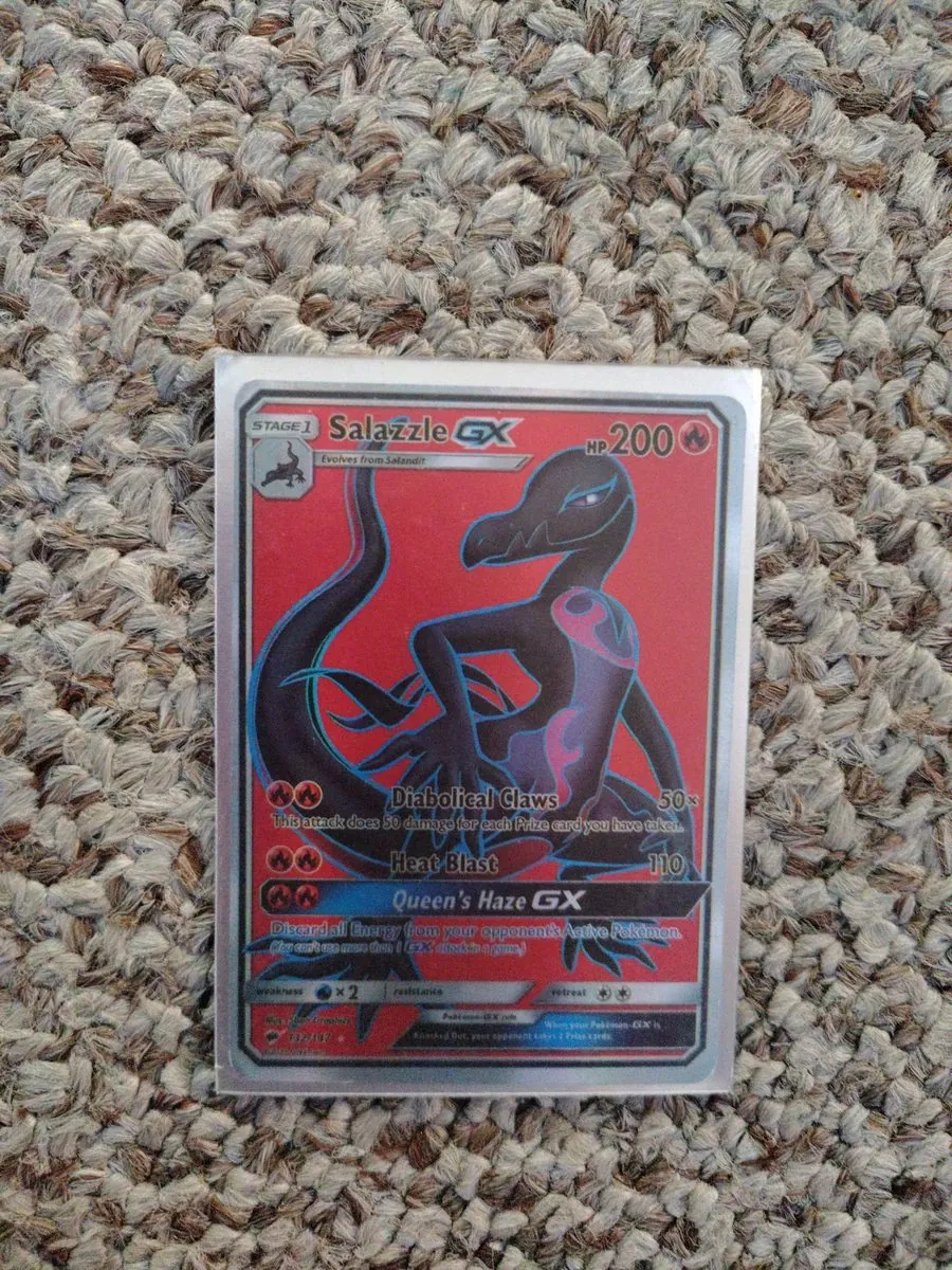KNOWN FAKE — educational sample: counterfeit Salazzle GX 132/147 from Burning Shadows, from the shop's October 2026 trade lot, photographed by the shop